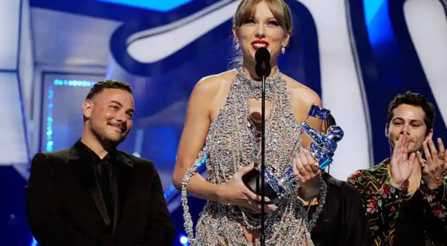 Taylor Swift wins high MTV video award, proclaims new album
