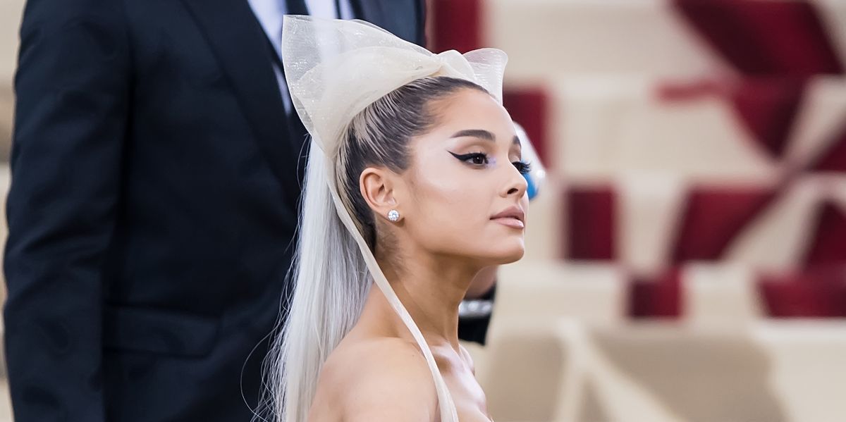 Ariana Grande Goes Retro In a Black Prada Bandage High With Inexperienced Checkered A-Line Skirt