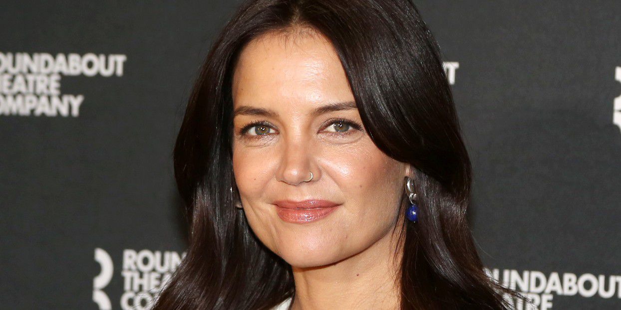 Katie Holmes Paired a Deconstructed Trench Coat Costume With French Woman Bangs