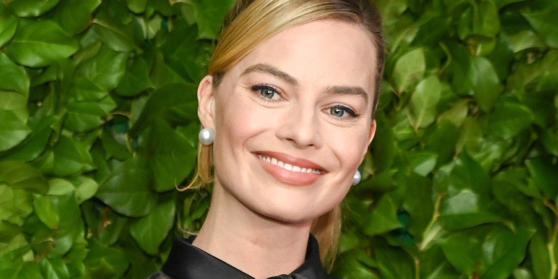 Margot Robbie’s Prada LBD and Matching Sheer Cape Paid Homage to the Creator of Barbies