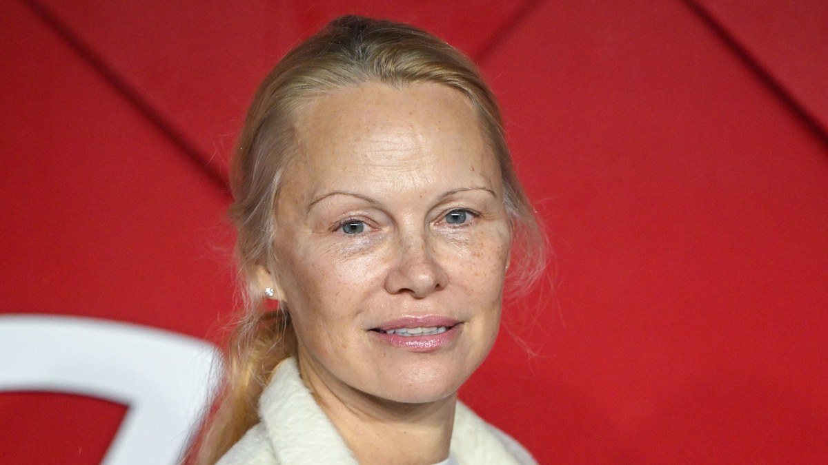 Pamela Anderson appears radiant in monochrome winter white have a look at star-studded pink carpet