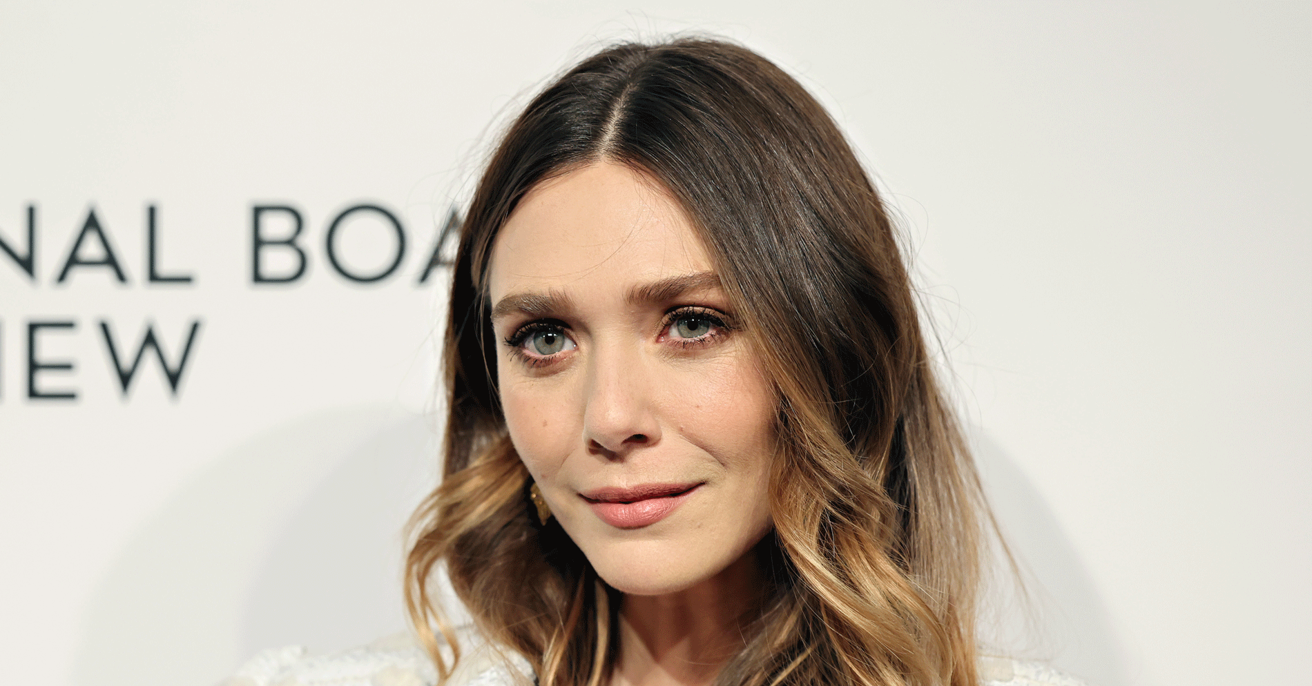 Elizabeth Olsen Wore a Very Y2K Development on the Purple Carpet