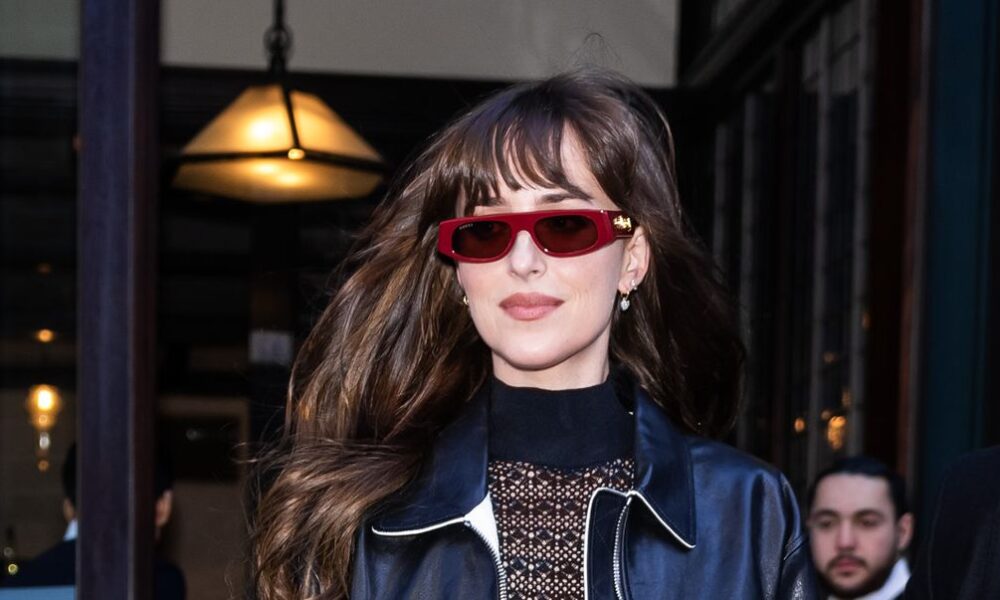 Dakota Johnson stuns in a see-through knit gown in NYC