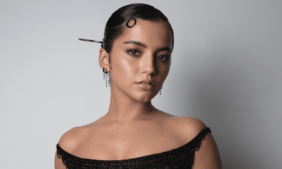 Isabela Merced Wore Layered Blush and Classic Versace to the ‘Madame Net’ Premiere