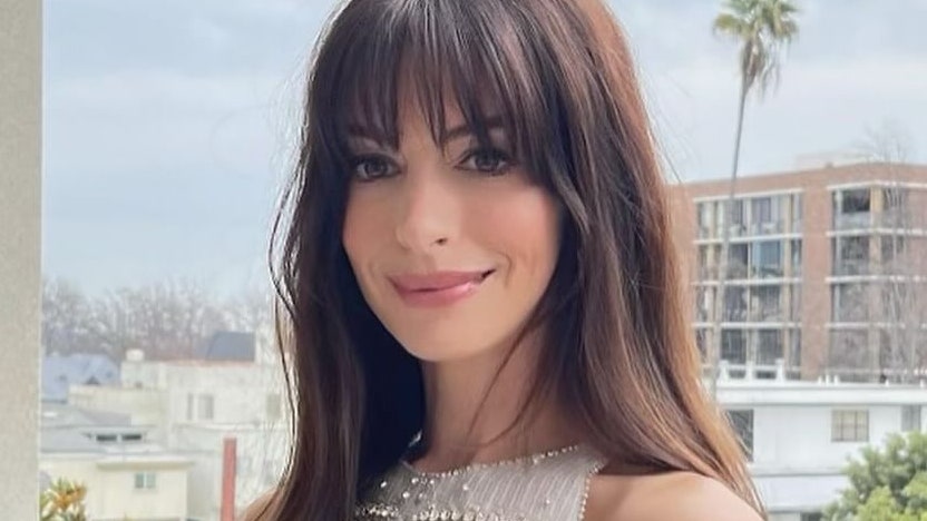 Anne Hathaway Pairs Her “Andy” Fringe With A Megawatt Manicure