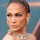 Jennifer Lopez Paired a V-Neck Costume With Ankle-Breaking Sneakers