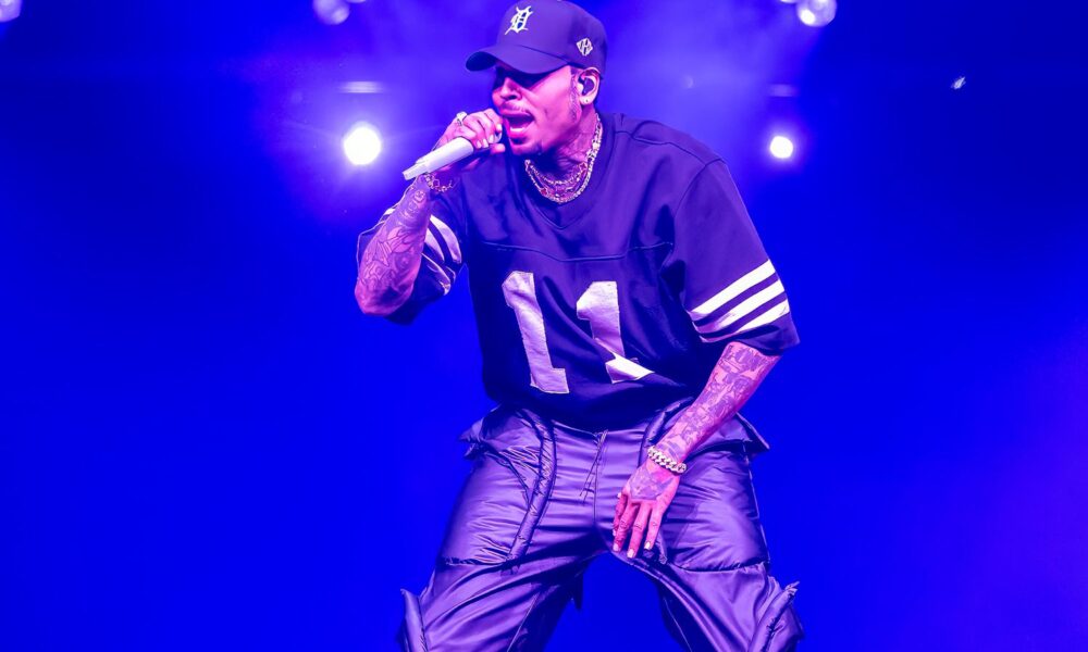 Chris Brown Will get Caught in Midair Throughout Present, Finally Rescued by Ladder