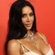 Kim Kardashian Wore Plunging Halter Prime to White Celebration Kim Kardashian Wore Plunging Halter Prime to White Celebration