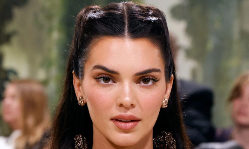 Kendall Jenner Matched a Tiny Purple Bikini to Her Lipstick