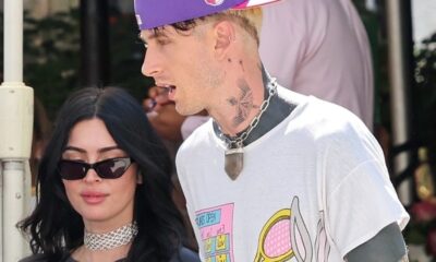 Megan Fox Goes Pantsless in a Live performance T-Shirt and Snakeskin Boots