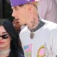 Megan Fox Goes Pantsless in a Live performance T-Shirt and Snakeskin Boots
