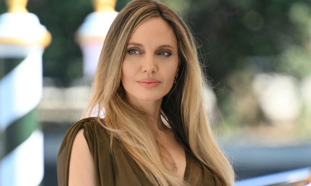 See Angelina Jolie’s Brown Chiffon Robe