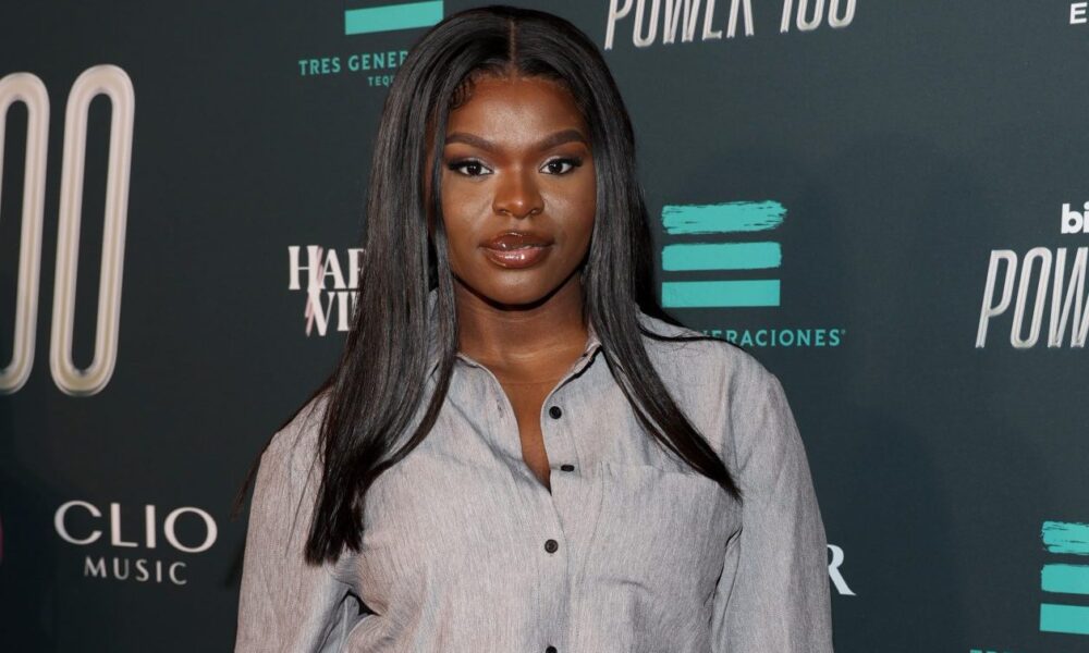 Social Media Reacts After She Unveils Child Bump Photographs