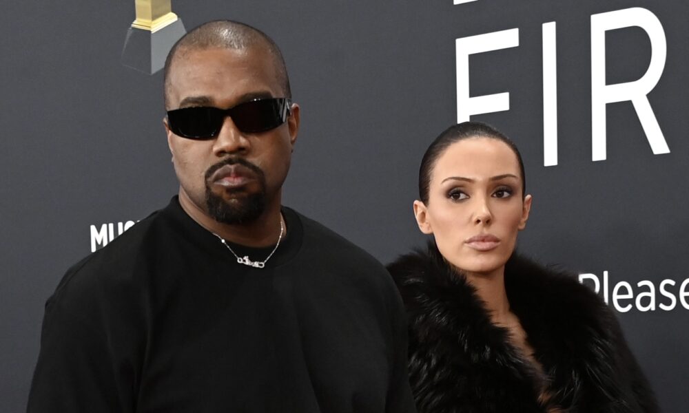 Bares It All On Grammys Crimson Carpet W/ Ye