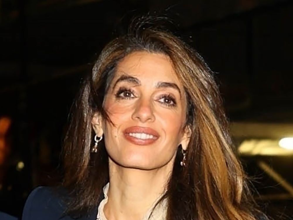 Amal Clooney Paired No-Brainer Pants With Spring’s Most Romantic Development