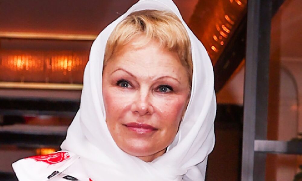 Pamela Anderson Wears the Summer season Scarf Development and a Bubble Skirt