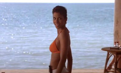 Halle Berry Leaping On A Trampoline In A Cute Swimsuit Whereas Getting Sprayed With Water Is Giving The Power I Want To Begin The Summer season