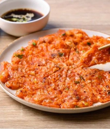 This Korean Kimchi Pancake recipes may have you making it every single day
