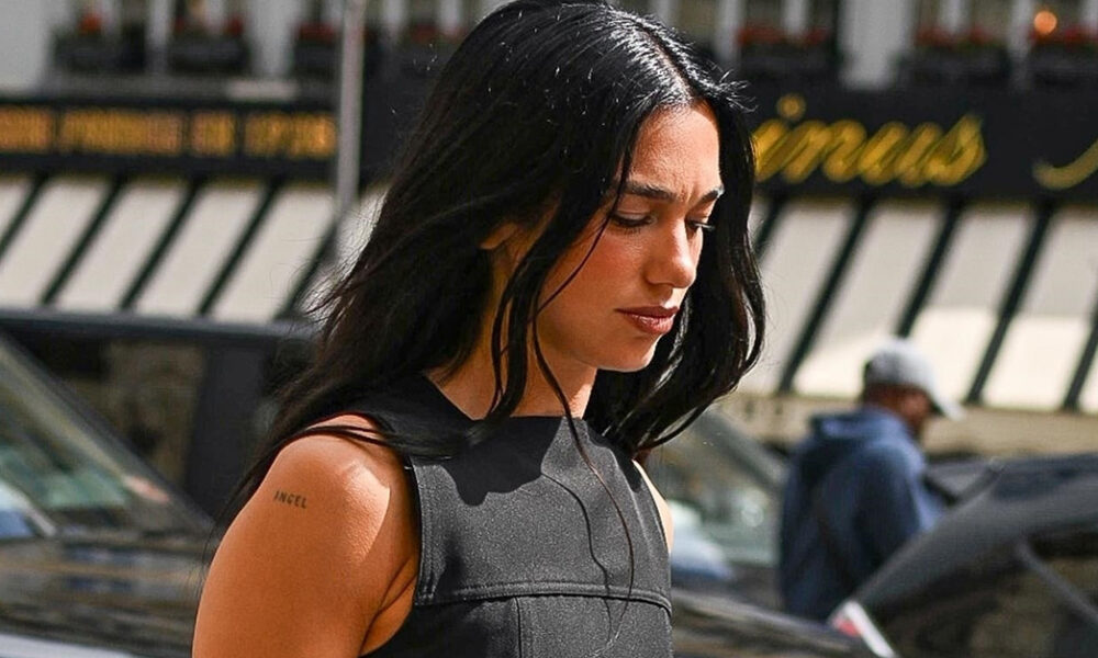 Dua Lipa Wore a Stylish Minidress With Knee-Excessive Boots in Paris