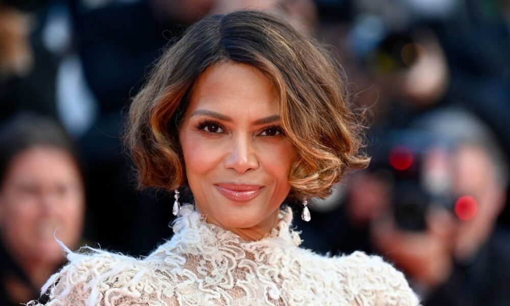 Halle Berry Pairs a Plunging One-Piece with Outrageously Huge Hat