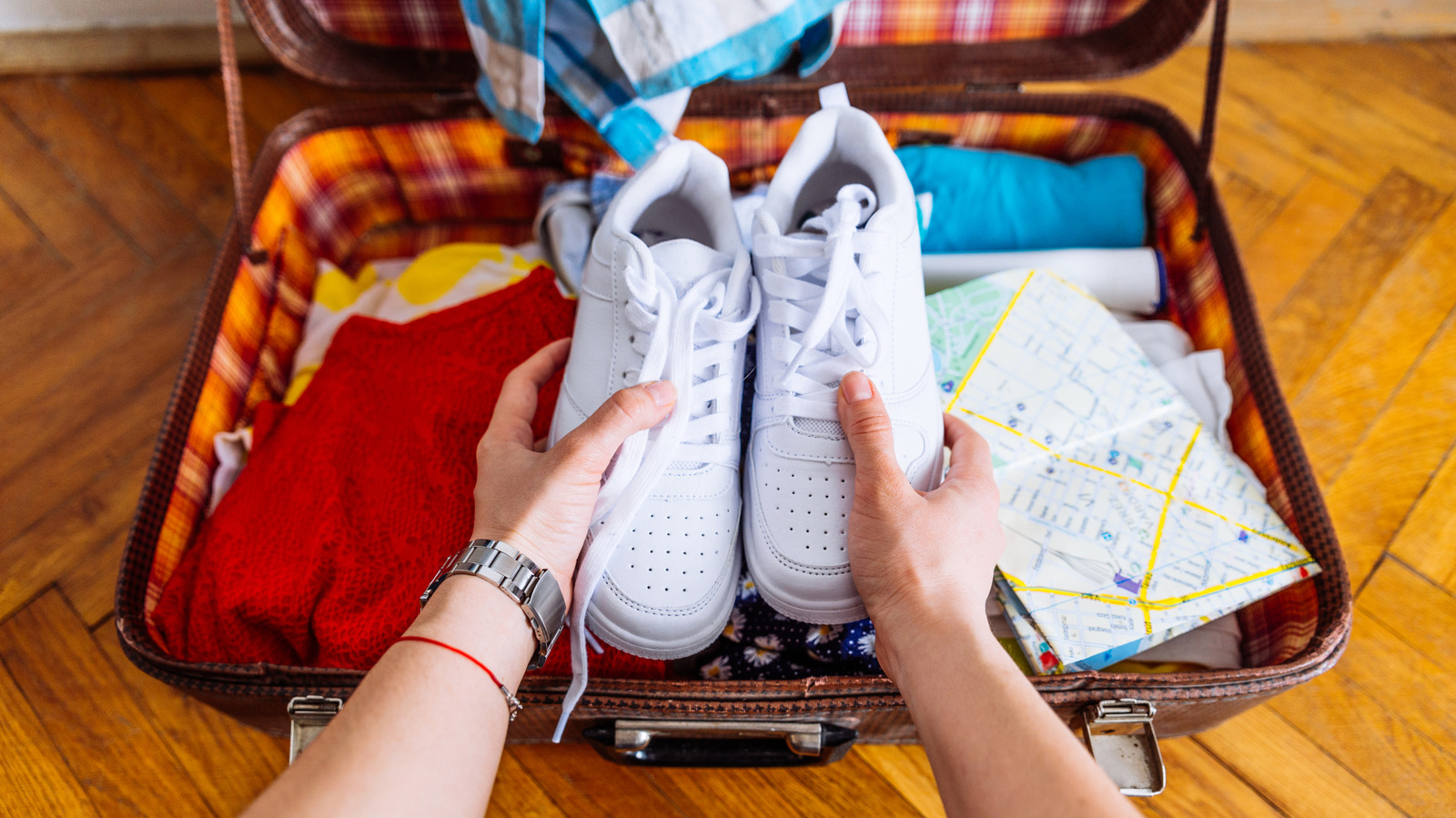 Why Vacationers Ought to Keep away from Packing Footwear In Baggage (And The House-Saving Spot To Put Them As a substitute)