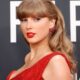 Taylor Swift Wore Suede Knee-Excessive Boots Forward of Fall