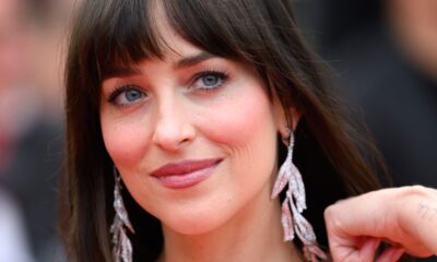 Dakota Johnson Simply Channeled Pamela Anderson With a Bombshell Updo