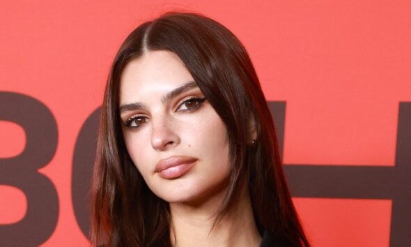 Emily Ratajkowski Lounges in Mattress Carrying Solely Sheer Pink Lace Lingerie