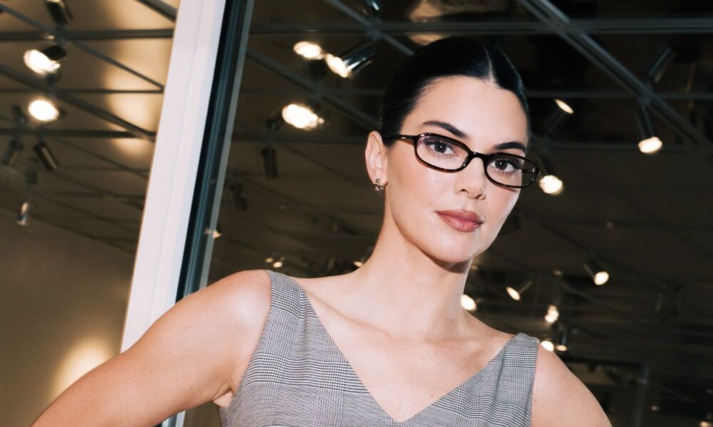 Kendall Jenner’s Plunging Gown and Glasses Are Peak Workplace Siren